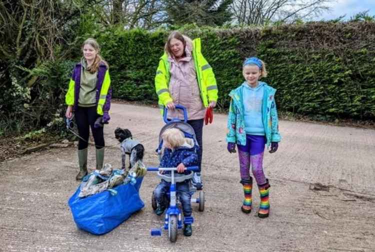 The Hansen family get stuck in clearing up Long Lane in Dunkeswell