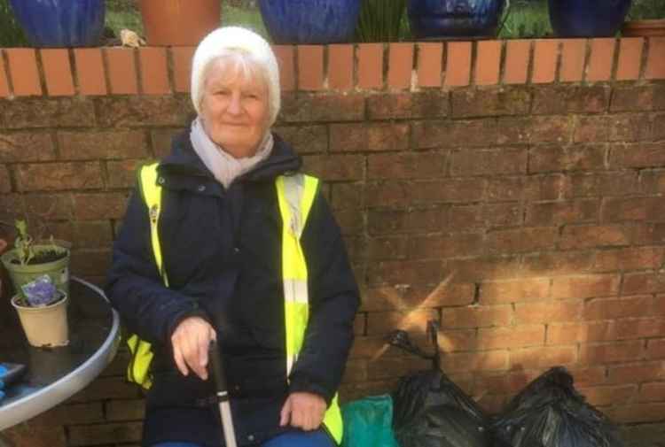 Pam Arnold with the bags of litter she's helped to collect