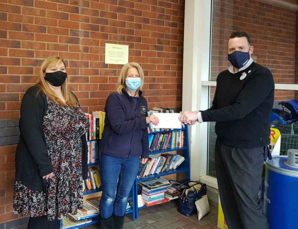 Pictured receiving the cash donation of £200 donation are Debbie Chappell Chairperson, Jane Kingston SENCO and Tesco Community Manager Duncan Sheridan-Shaw