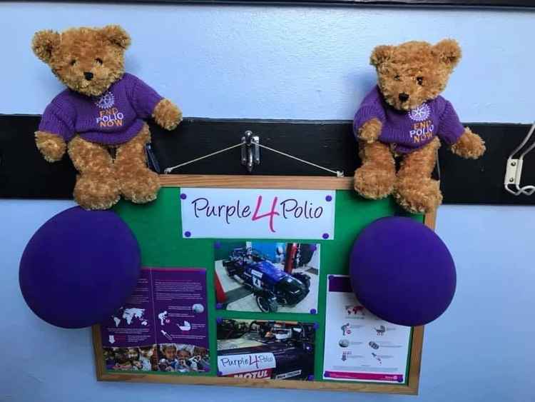 Small notice board with Purple4Polio teddy bears donated by Mark Tredwin