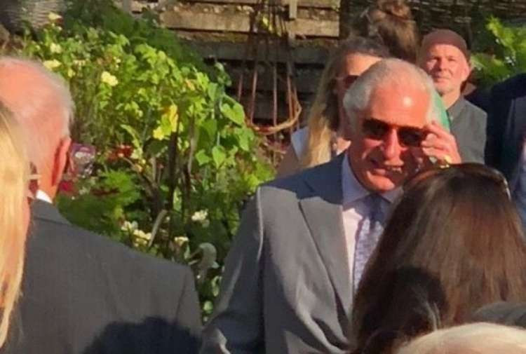 Prince Charles mingles with guests at the Duchy Nursery