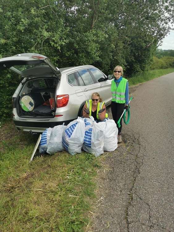 Honiton Litter Pickers with some of the rubbish they have collected.