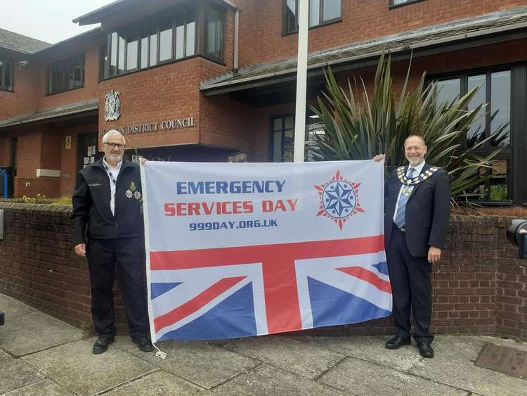 Councillor Mark Heard and officer Les Davis with the special flag (Credit: Maldon District Council)