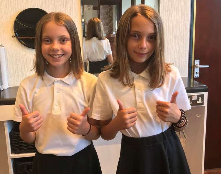 Erin (left) and Adele (right) chopped off their hair to raise money for charity