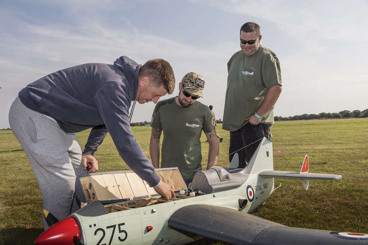 Stephen, Andrew and Chris looking at the Fairy Gannett (Credit: Stow Maries)