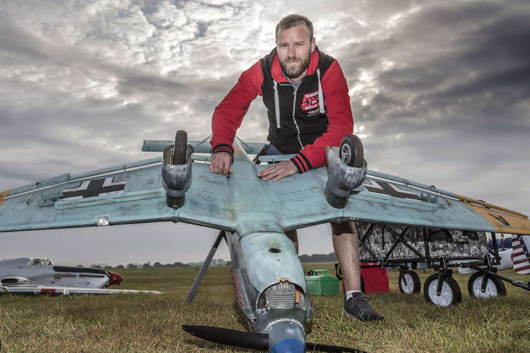 John Mason fixing the wings to his Stuka aircraft (Credit: Stow Maries)