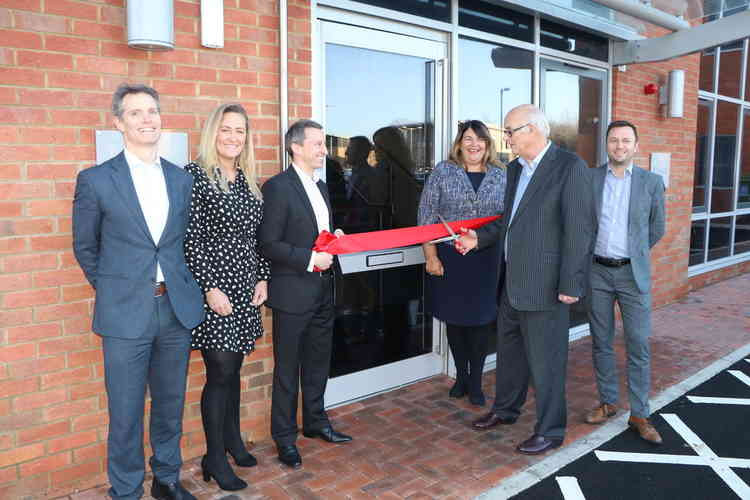 Fishers staff outside the solicitors' new offices at Ivanhoe Business Park in Ashby