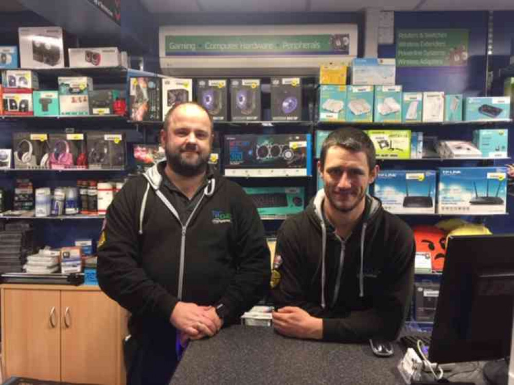 Phil Barnfield (left) and Kyle Chisnall behind the counter at PC Clinic in Ashby