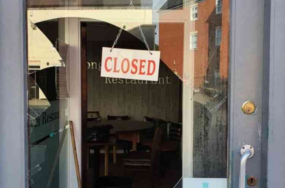 The front door of the restaurant was smashed overnight