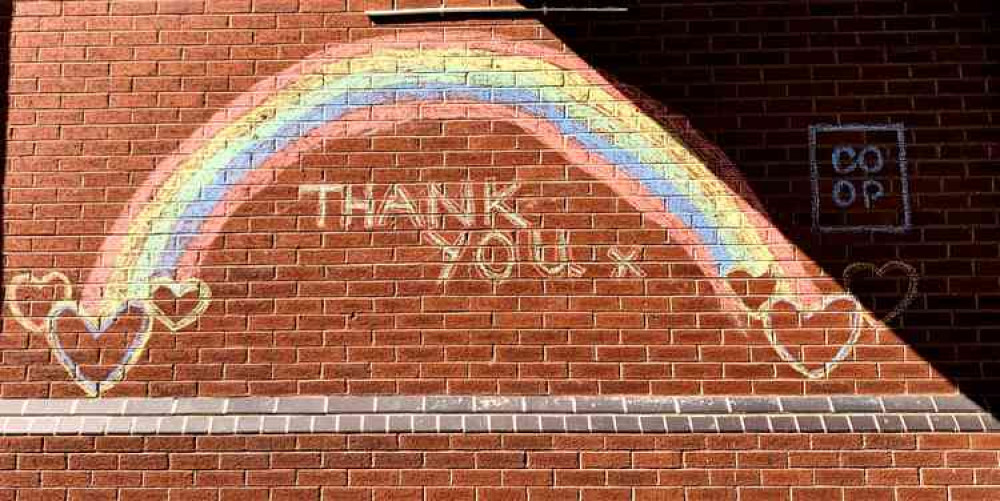 This was Kristen's initial rainbow design and others drew more pictures with the chalk provided