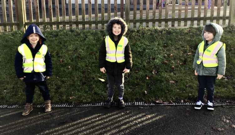 Children from Ashby Willesley Primary School wearing the Specsavers vests