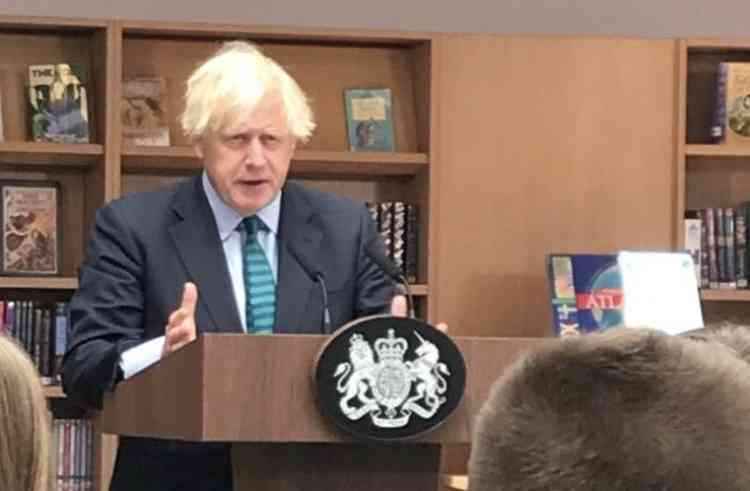 Prime Minister Boris Johnson pictured last year during a talk at Coalville's Castle Rock School