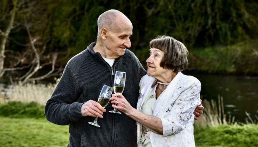 Denis and Ann Fawsett toast their Euromillions win