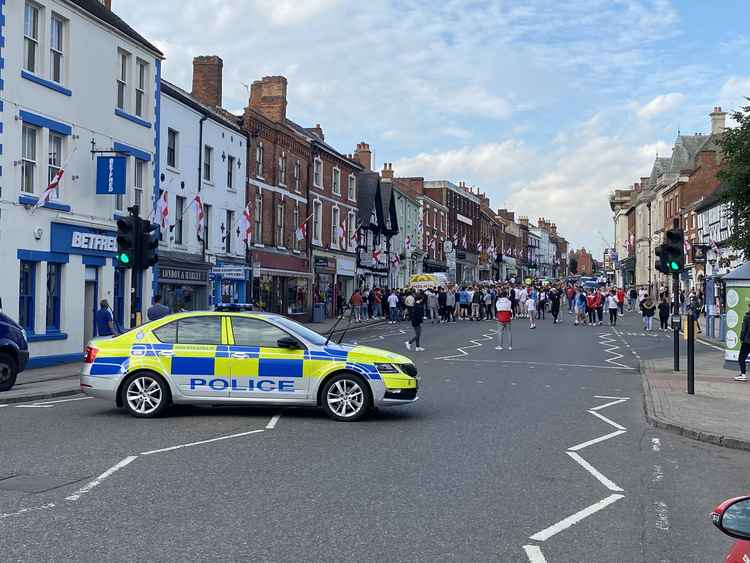 Police closed Market Street on Tuesday evening following the England v Germany game as fans celebrated in the road. Photo: Ashby Nub News