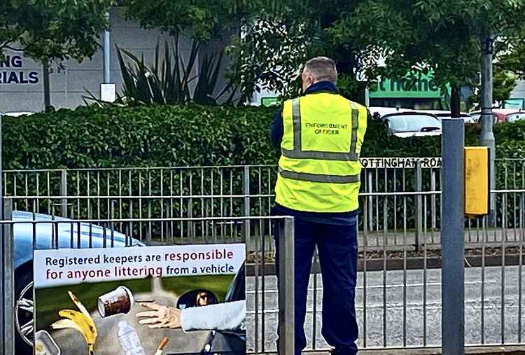 A council enforcement officer watches out for littering motorists on Nottingham Road in Ashby. Photo: North West Leicestershire District Council