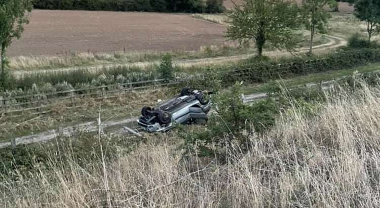 A car came off the carriageway and overturned. Photo: Coalville Fire Service