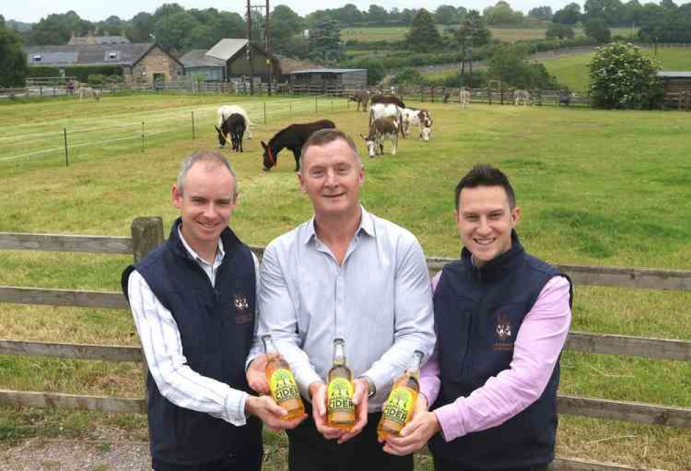 Pictured with Lyme Bay Winery's Bob Harding (centre) is Ben Winnard – Retail and Catering Operations Manager (left) and James Searle – Head of Commercial Activities (both from The Donkey Sanctuary).