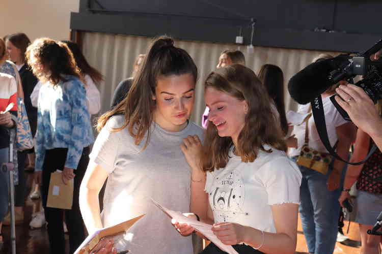 Sidmouth College students pick up their GCSE results.