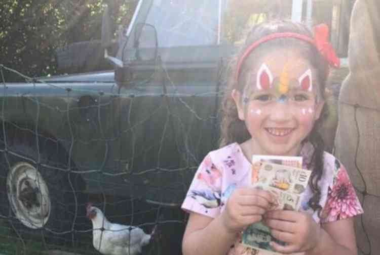 Ruby Kearsley winning the chicken roulette prize money