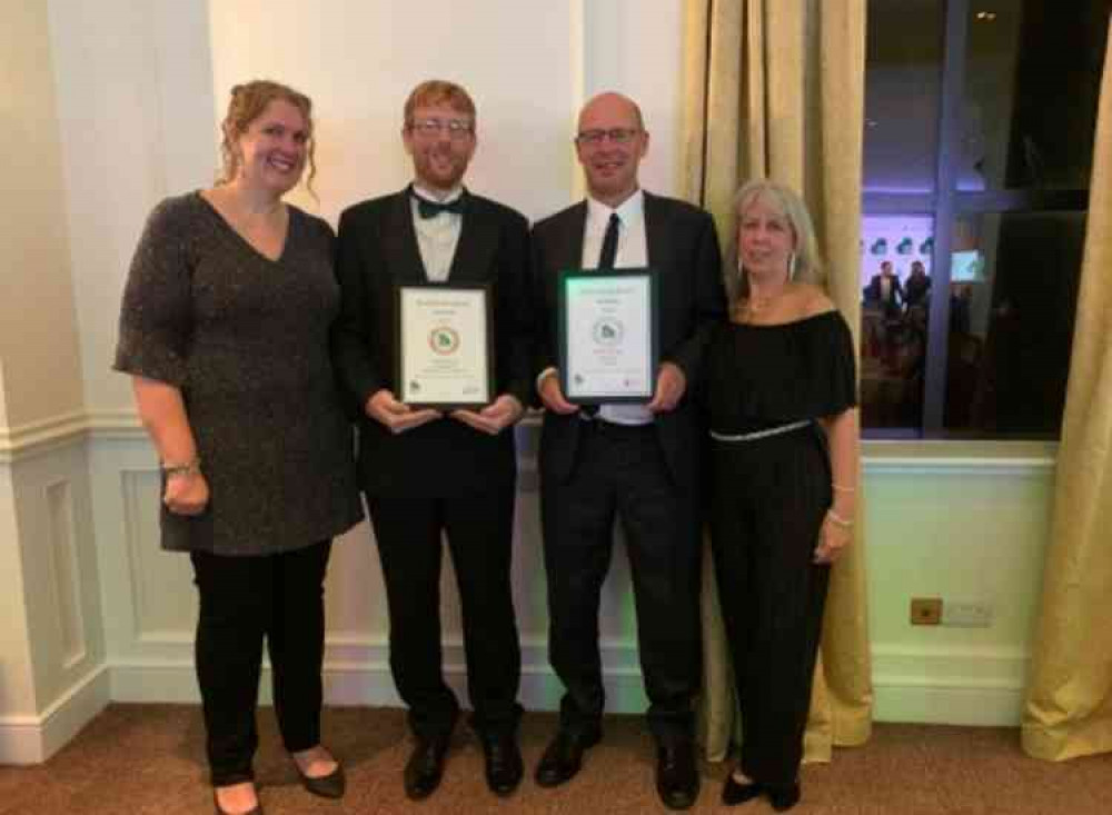 Sidmouth Gin's John Hammond and Ebb Tides' Tony Coulson with their awards.