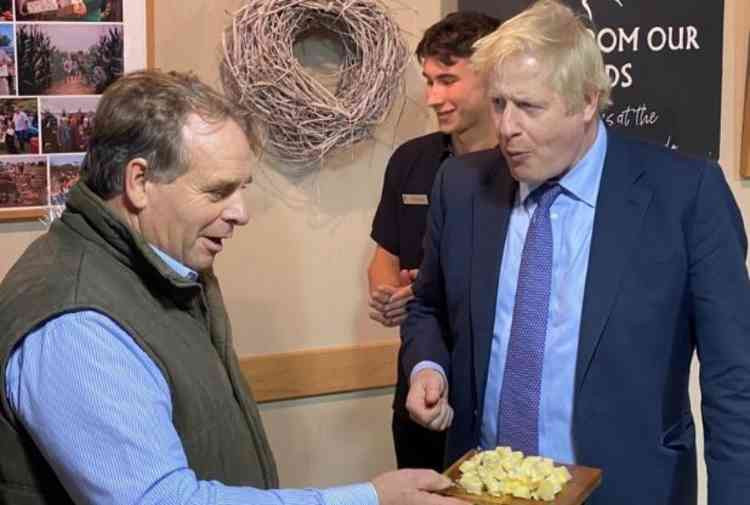 Neil Parish (left) pictured with Prime Minister, Boris Johnson. Photo credit: Richard Chesterton