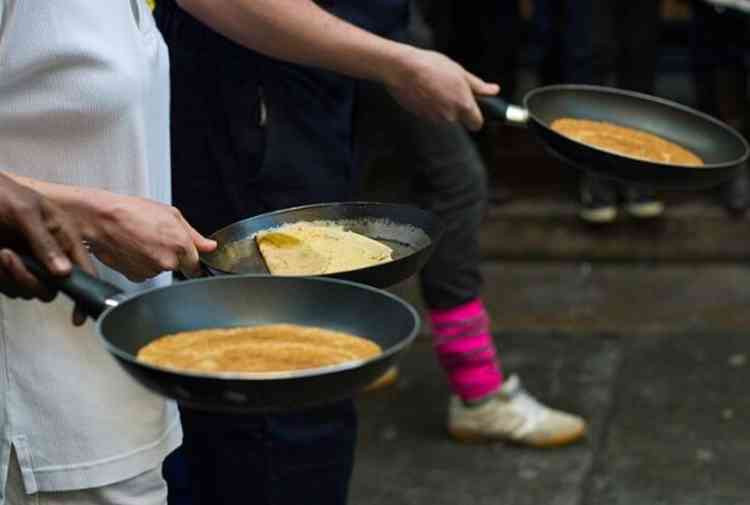 A stock image of a pancake race. Image courtesy of Pedro Figueiredo.