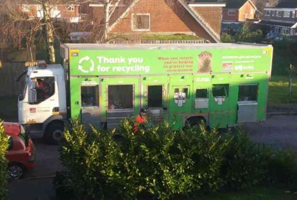 An East Devon District Council recycling lorry in action. Image courtesy of Daniel Clark.
