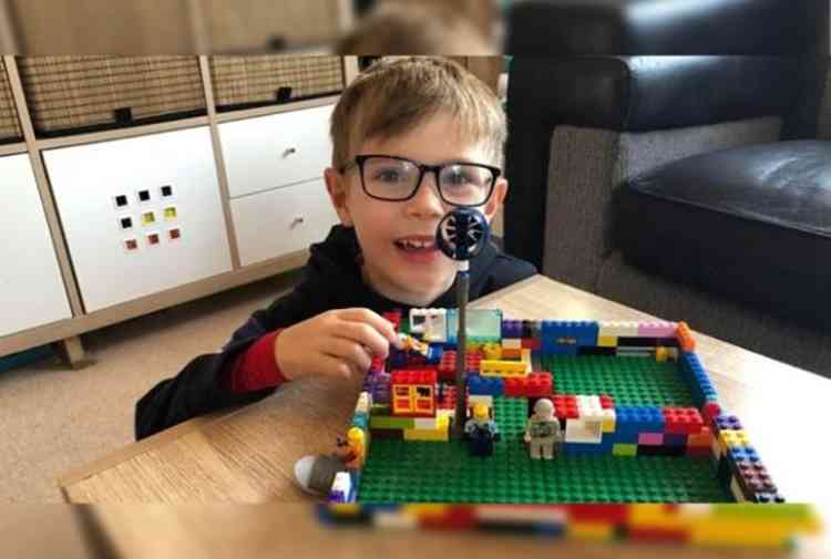 Freddie Taylor, 5, with his Lego Nightingale Hospital.