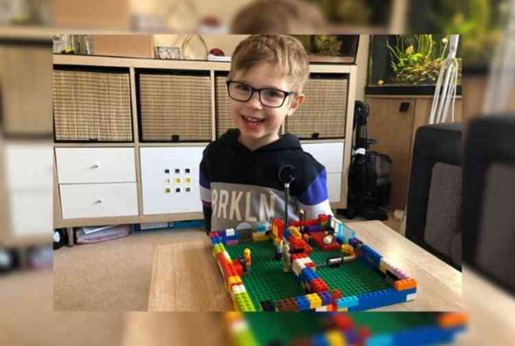 Freddie Taylor, 5, with his Lego Nightingale Hospital.