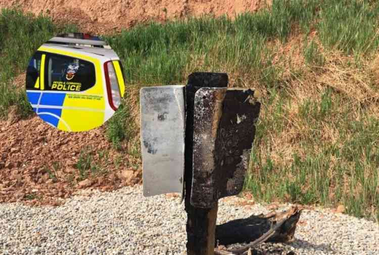 The sign set on fire on Jacobs Ladder Beach. Image courtesy of East Devon District Council.