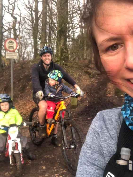 The McDonald family enjoying the mud