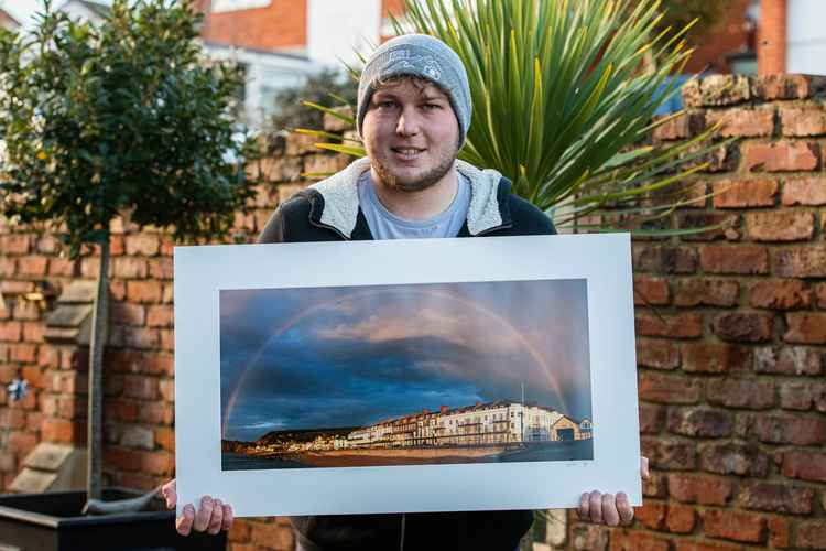 Local photographer Kyle Baker with his fundraising limited edition print