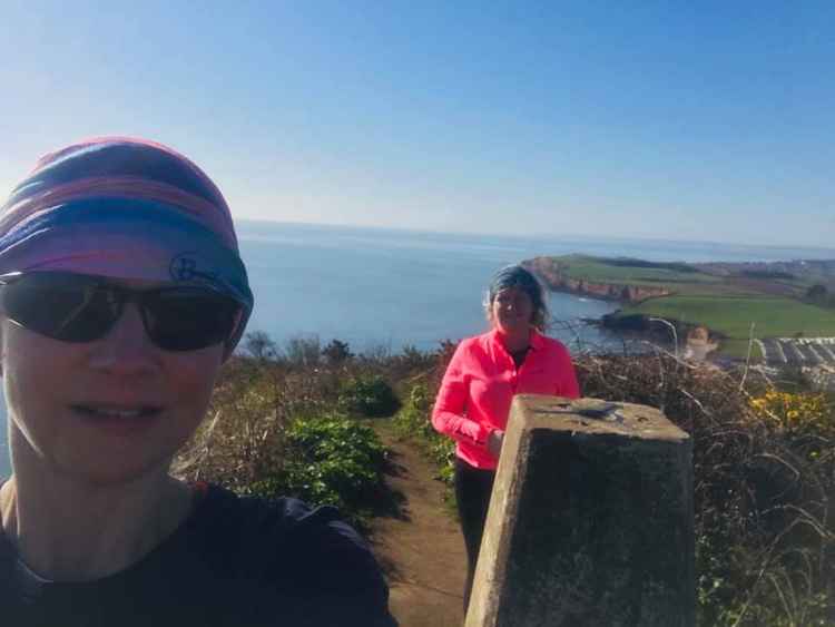 Liz Goodman and Alison Long enjoying the view from High Peak Trig