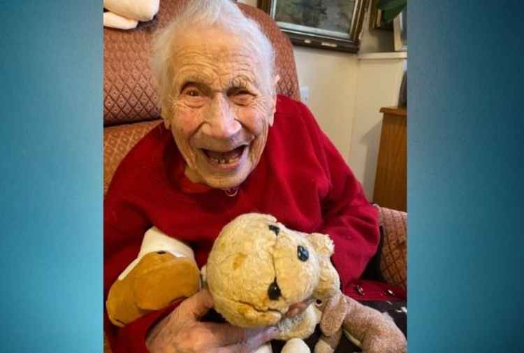 Topsy with her 'therapy' toy dog, Dombie