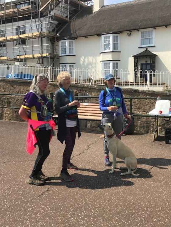 Smiles all round for Carol McManus, Julia Haddrell and Ann Cole with Ivey the dog