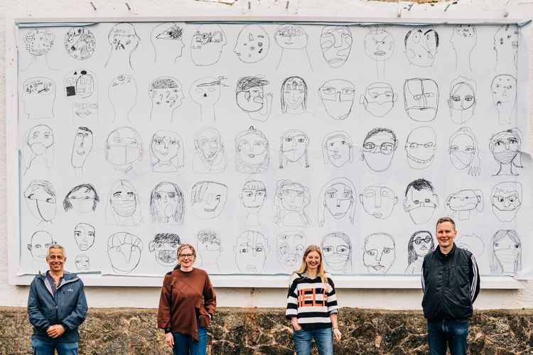 Town council chairman Ian Barlow, Louise Cole and Coco Hodgkinson, both Directors of Sidmouth Coastal Community Hub, and artist David Shrigley