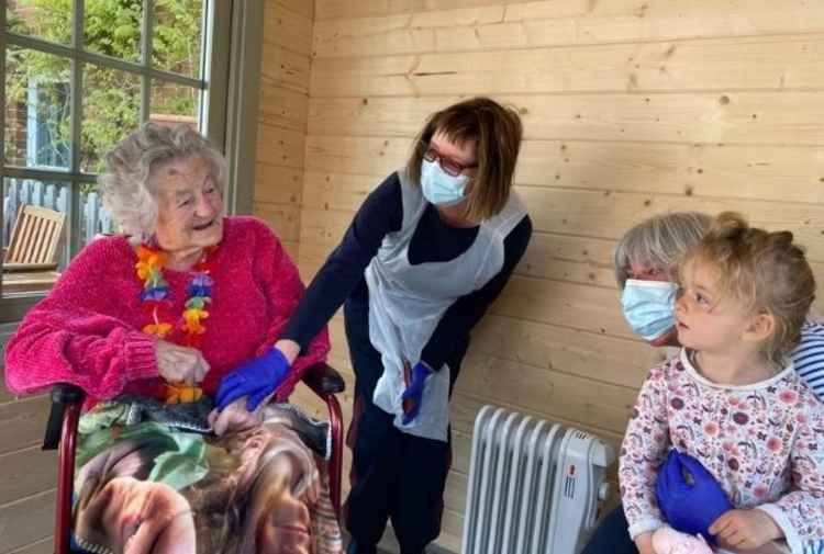 The smiles say it all - Brenda with family visitors