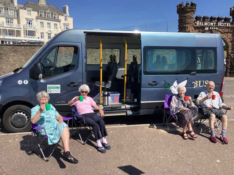 Shirley, Edith, Janet and John enjoying the morning sun on Sidmouth seafront.  John wins the knobbly knees competition!