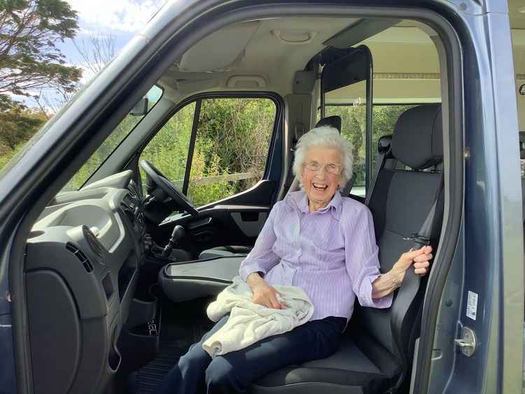 Jean, a resident of Dove Court in Seaton during an outing to Charmouth on Wednesday, June 16. She had just been told it was her job to drive the bus back!