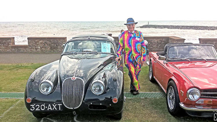 Mike Lavers, coordinator of Sidmouth Classic Car Show, in his distinctive suit