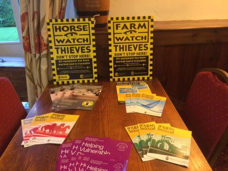 Lealets and posters on display at the Neighbourhood Watch meeting