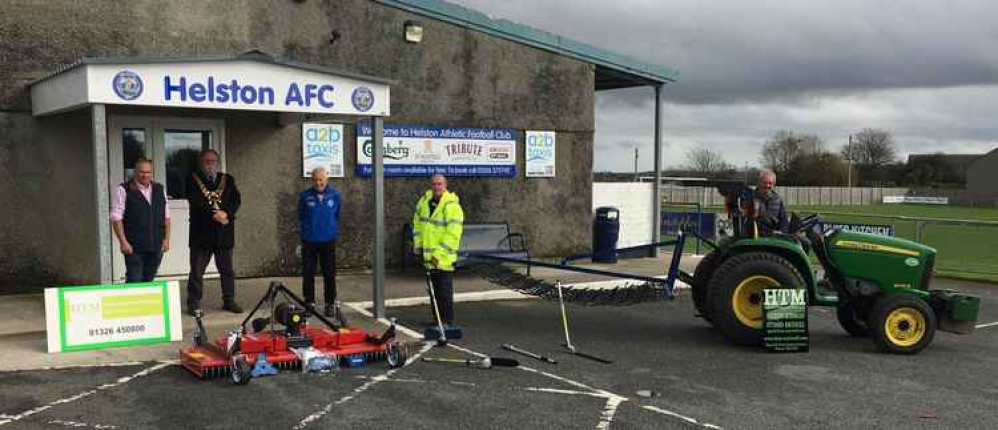 Helston Mayor John Martin, Paul Brooks of Helston Trailers & Machinery, Helston Athletic Football Club Head Groundsman, John Reynolds, and Club Committee representatives Barry Julian and Geoff Taylor