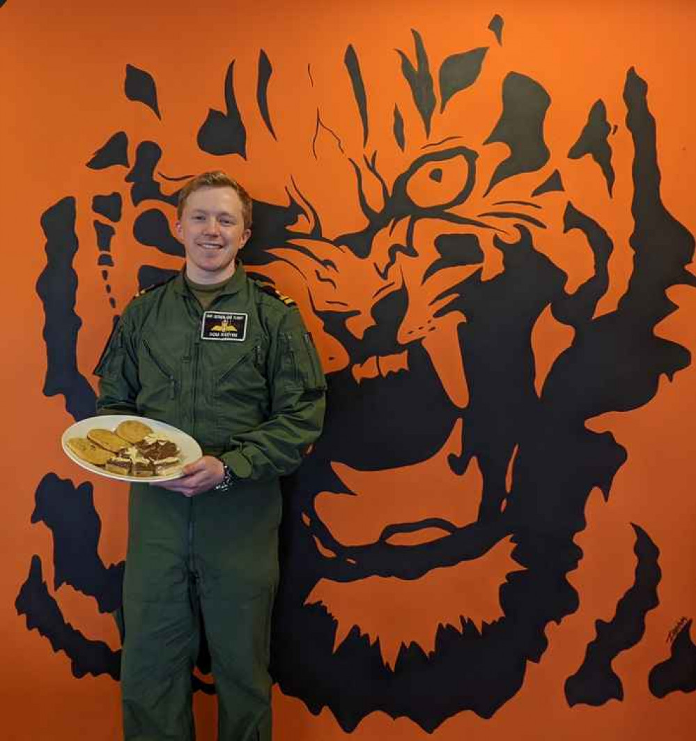 Lt Dominic Raeyen from 814 NAS The Flying Tigers with his bakes as part of the Gr-814 British Bake Off raising funds for Children's Hospice South West