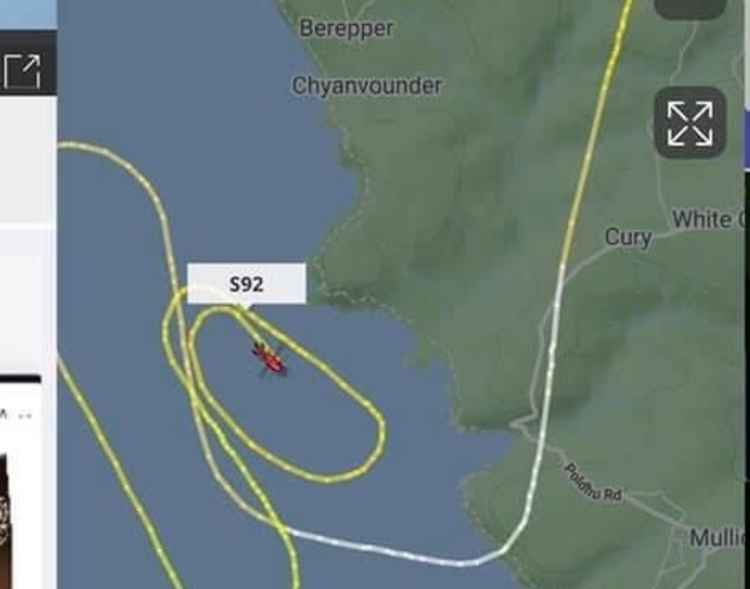 The coastguard helicopter circling the area yesterday. Details shared by Trudi Baird.