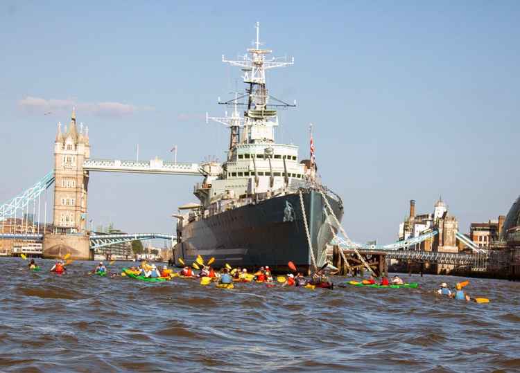 The kayakathon alongside HMS Belfast.