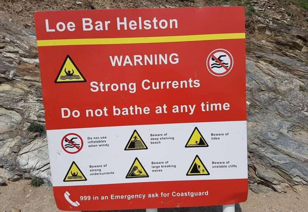 A warning sign at Loe Bar.