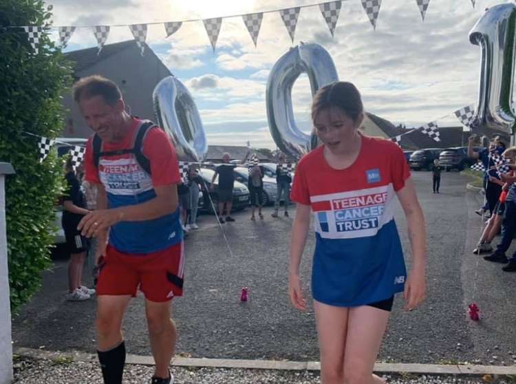 Lily and dad Baz at the finish line.