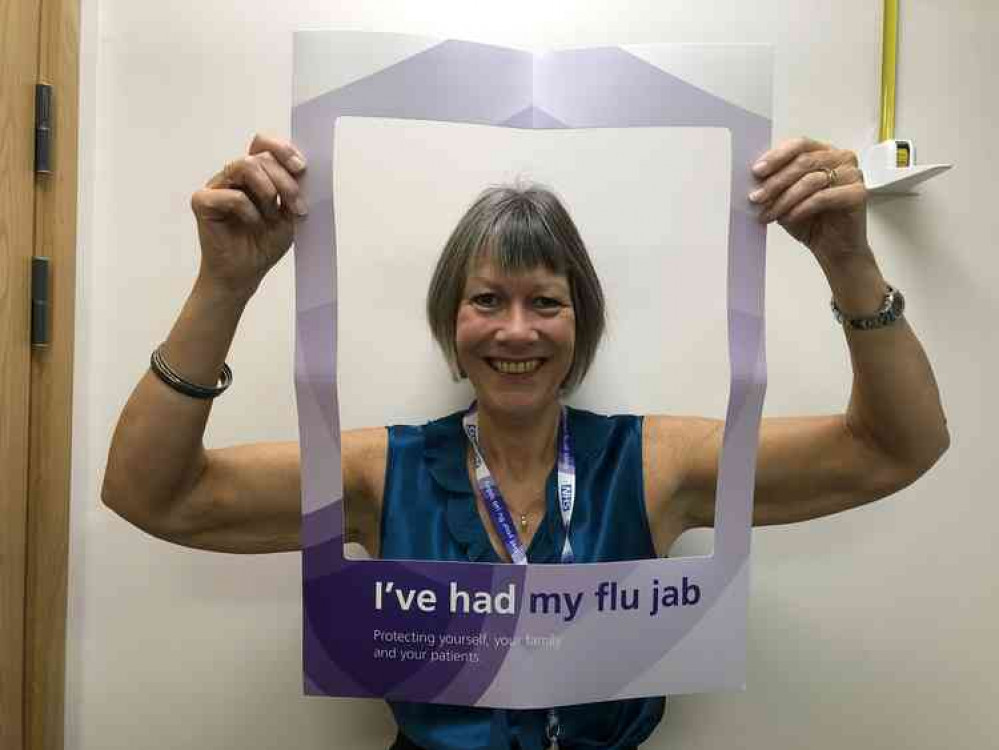 Connie Stocker, interim hospital director at Shepton Mallet NHS Treatment Centre, leads the way after being vaccinated against flu. All 180 members of staff at the hospital have been offered free flu jabs.