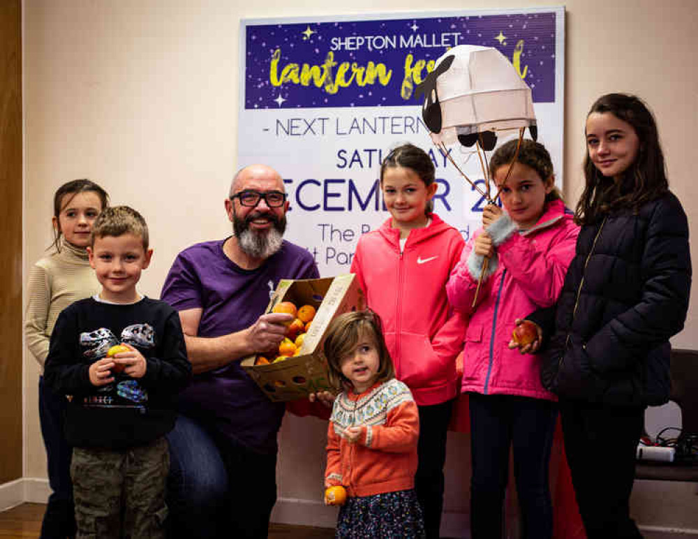 Patrick Blandford, director at Riverford Organic, with fruit donated for children attending the lantern workshops