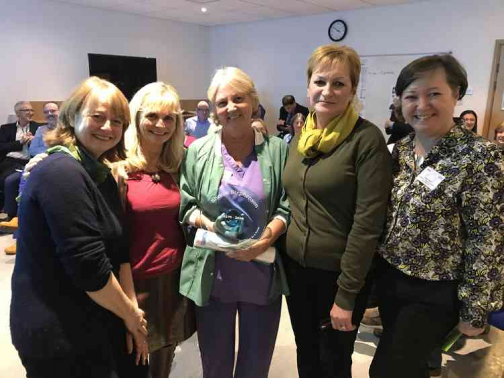 Sheron Stephenson, centre, celebrating her 50th year as a nurse with, from left, colleagues Nicola Lowson, Julia Cann, Liz Green and Lesley Boler, chief nurse for quality and governance at Care UK